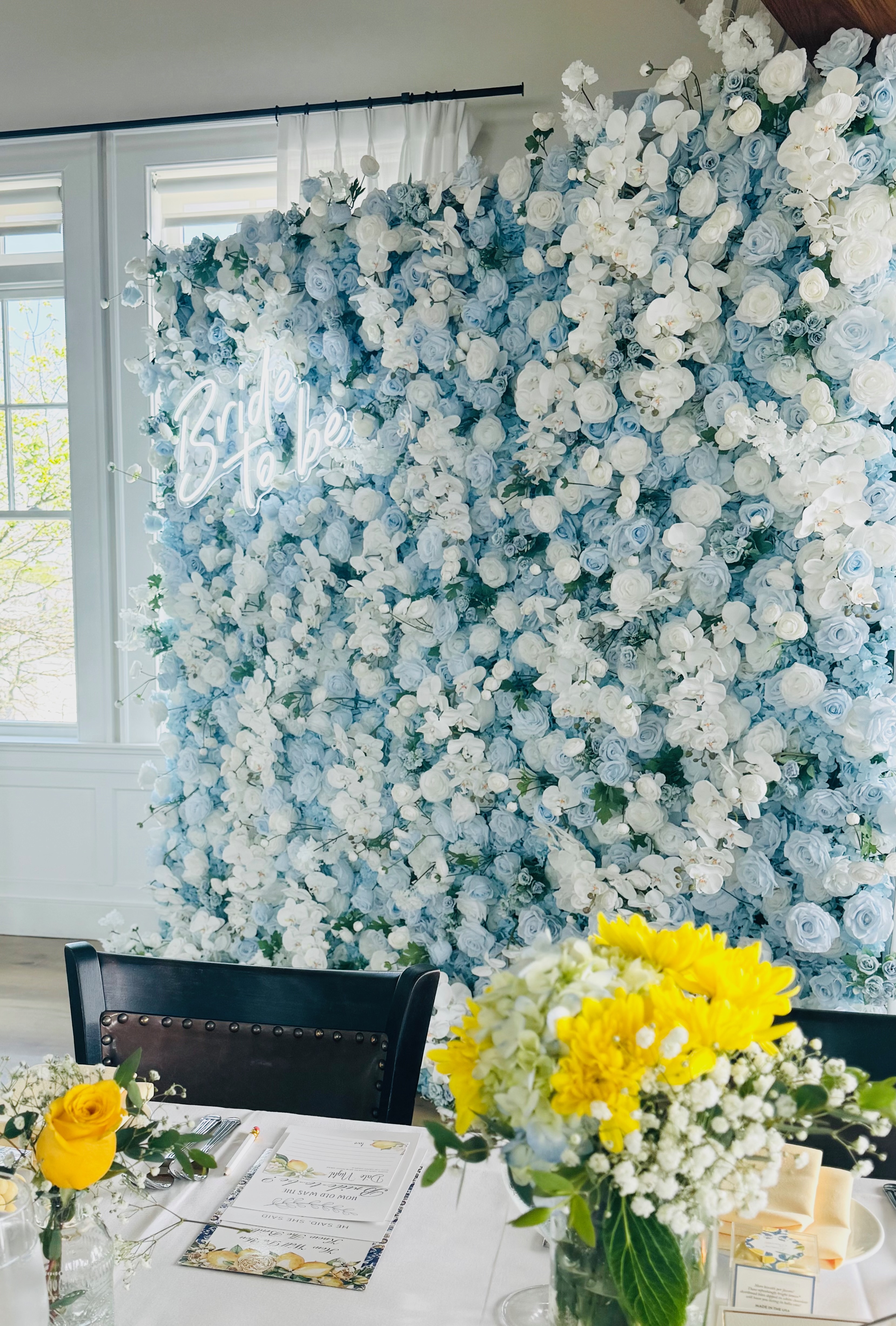 blue flower wall backdrop for bridal shower celebration