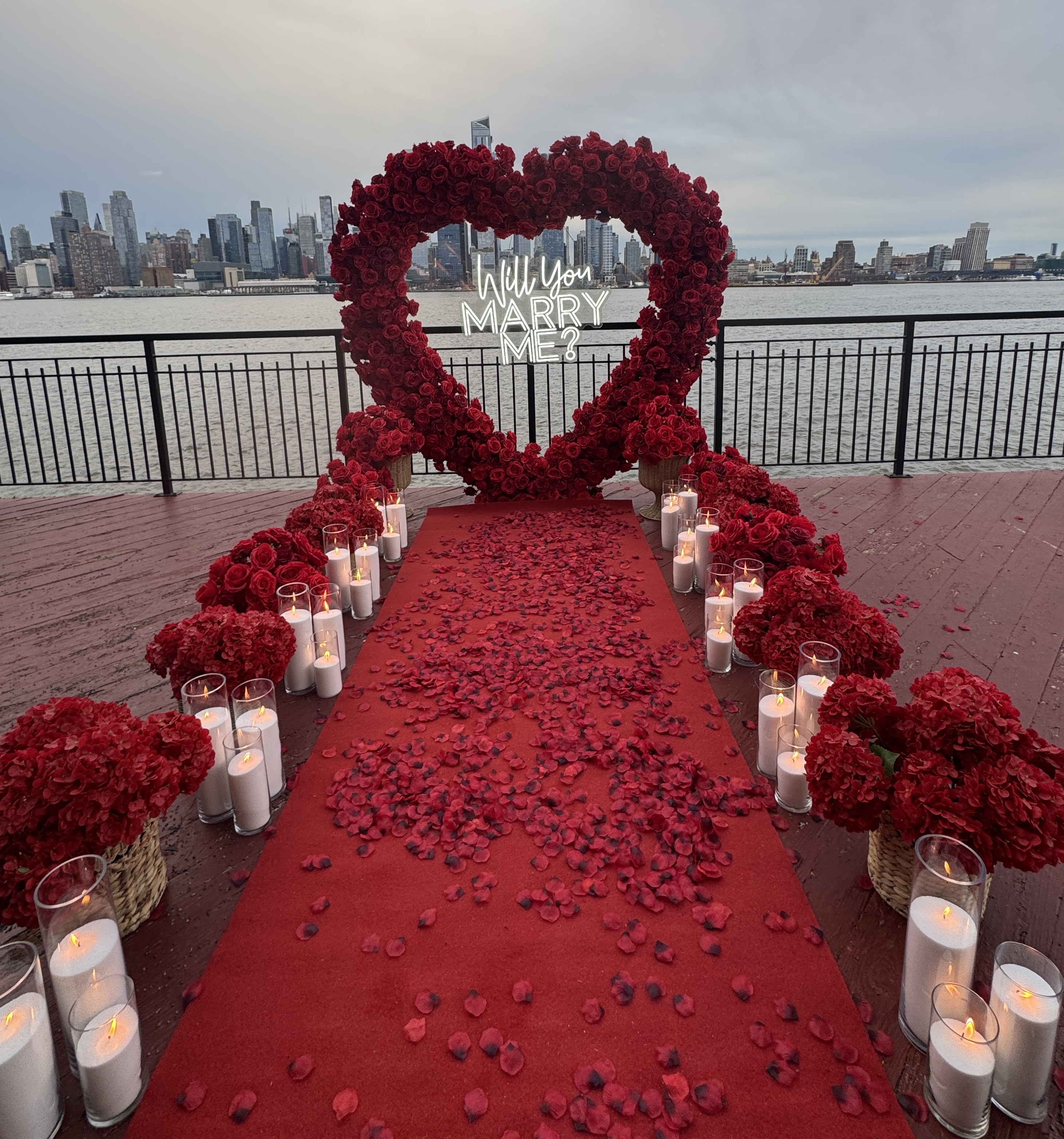 Romantic proposal setup in Jersey City NJ with candles and city view backdrop nyc view skyline